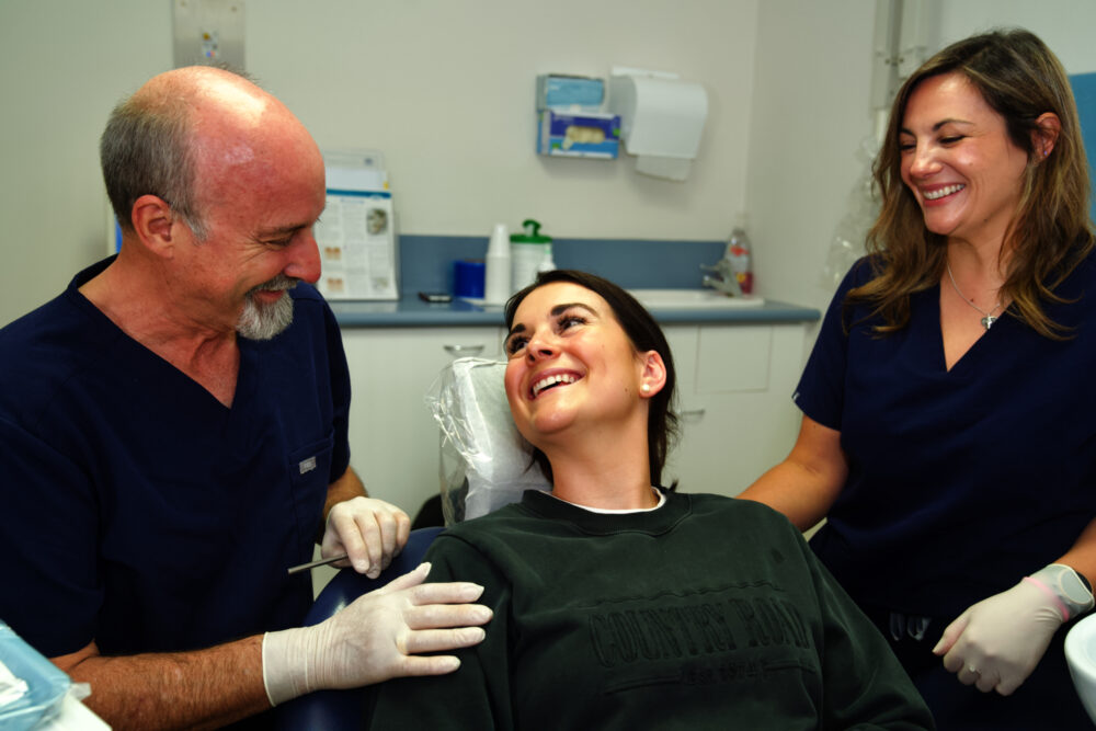 A happy patient at Macleod Dental